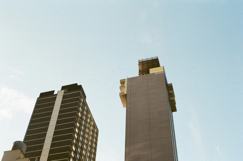 gray concrete high rise building at daytime