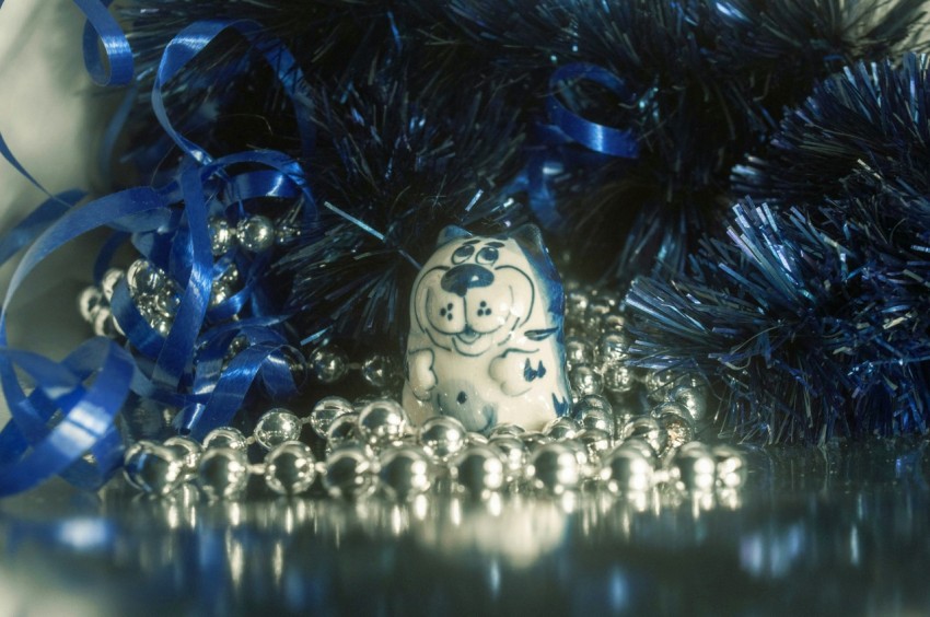 a close up of a blue and silver decoration