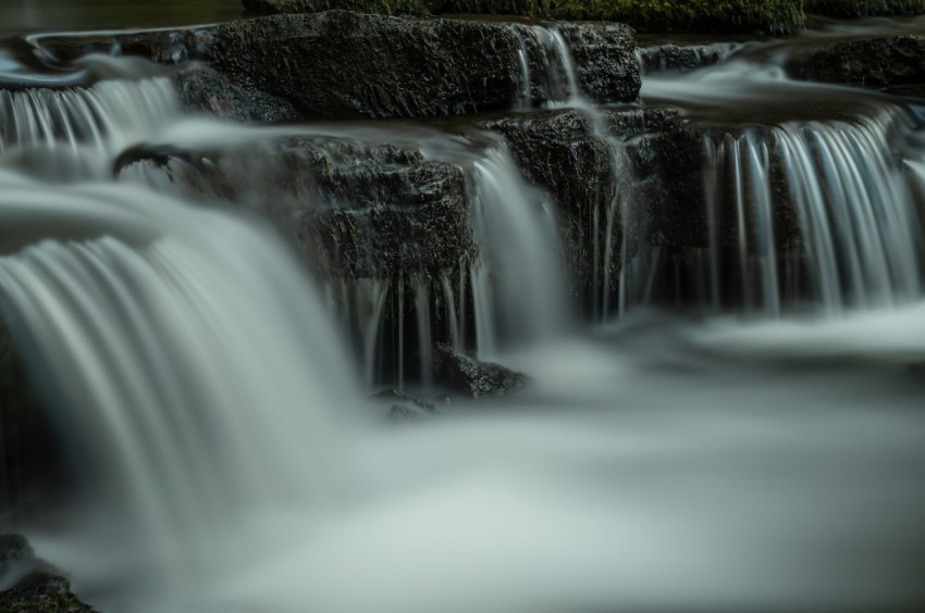 time lapse photograph of waterfalls