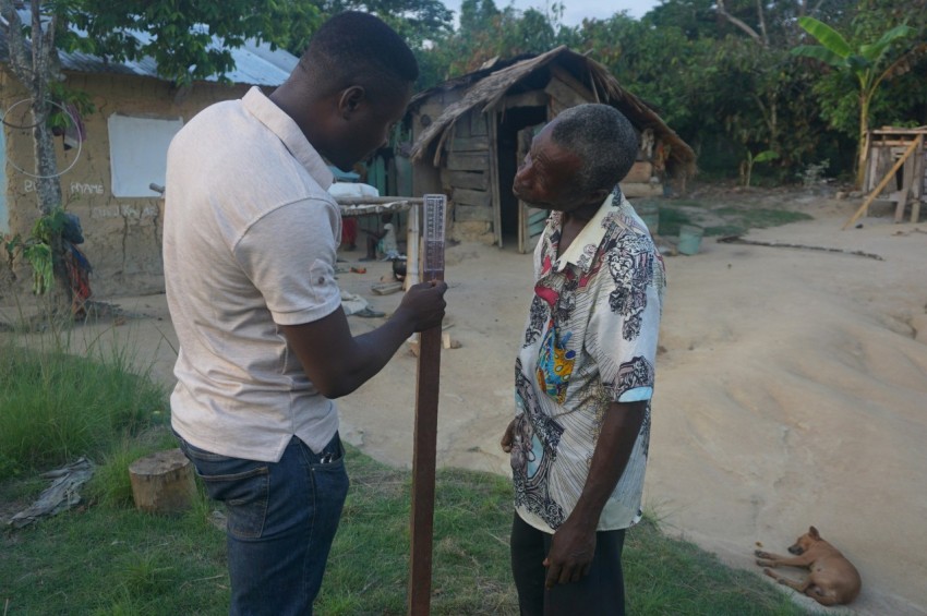 a couple of men standing next to each other