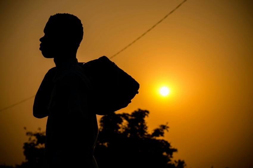 silhouette of man during sunset