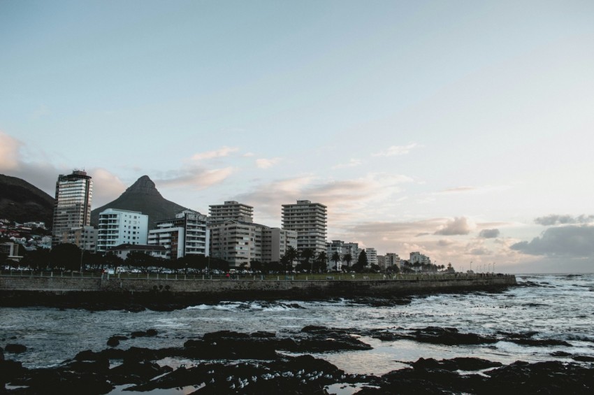 city skyline across the sea during daytime