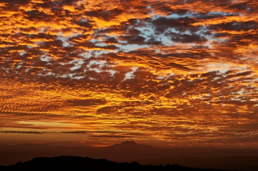 silhouette of mountain during golden hour