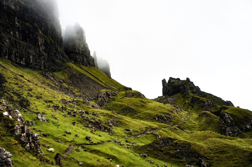 mountains under cloudy sky