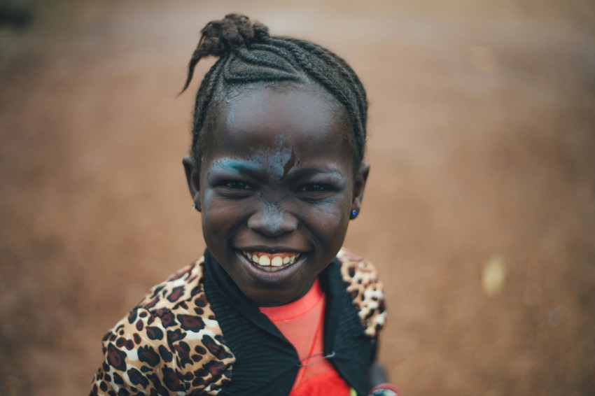 girl smiling in front of camera