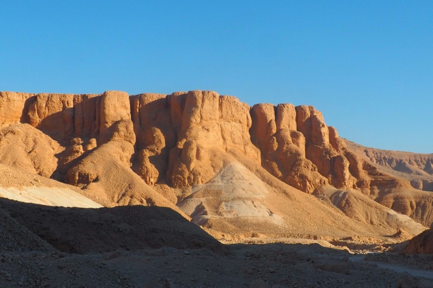 a mountain range in the middle of a desert