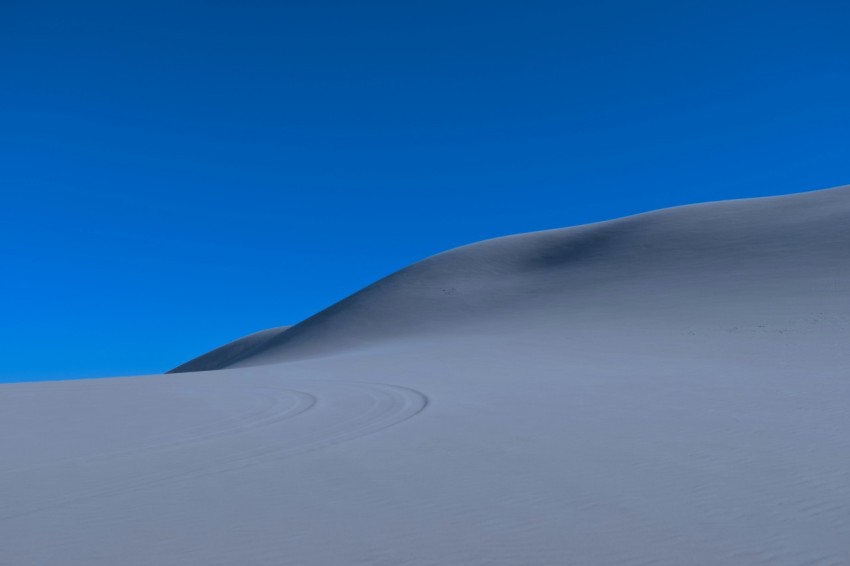 a large flat area with a blue sky