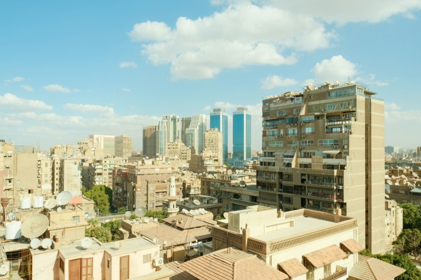 a view of a city with tall buildings