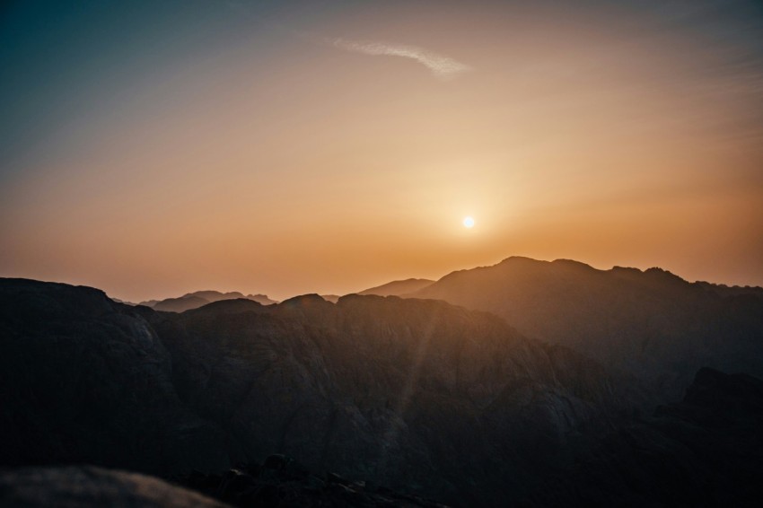 silhouette of mountains during sunset q27CoqXIp