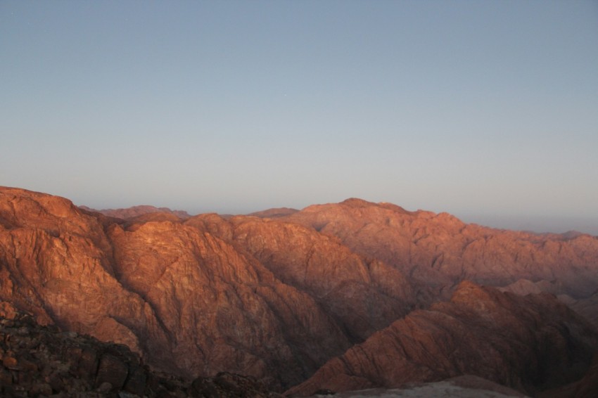 a view of a mountain range at sunset R