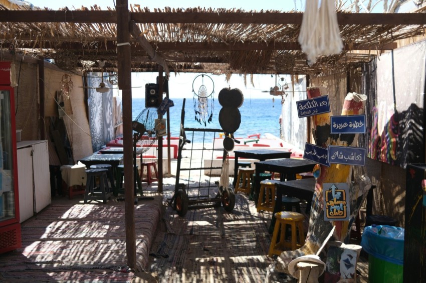 a small shop with tables and chairs