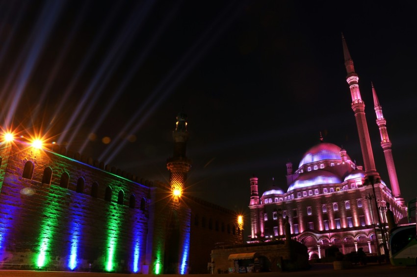 green and blue lighted building during nighttime