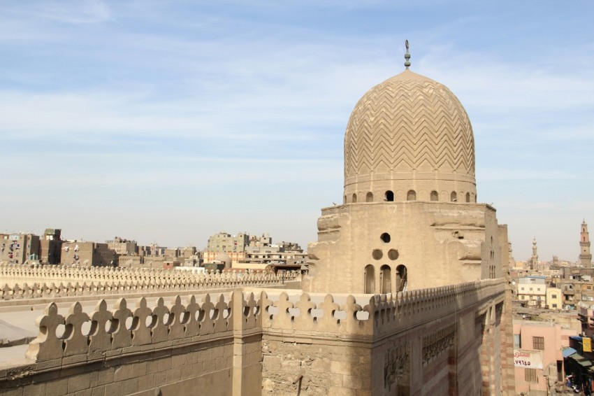 a tall building with a large dome on top of it