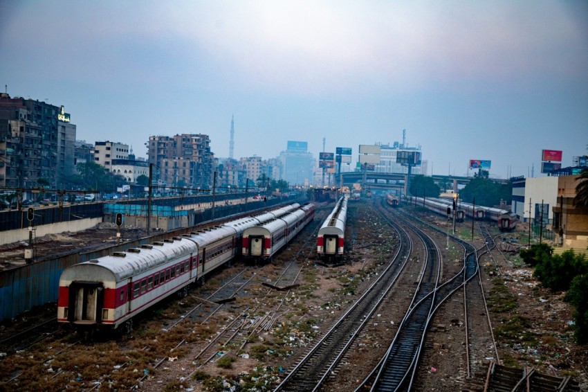 a couple of trains that are sitting on the tracks