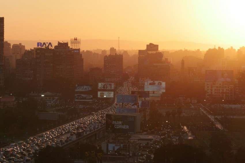 city skyline during orange sunset s_6zhfZH