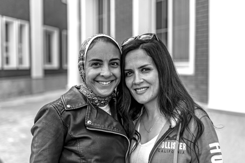 a couple of women smiling