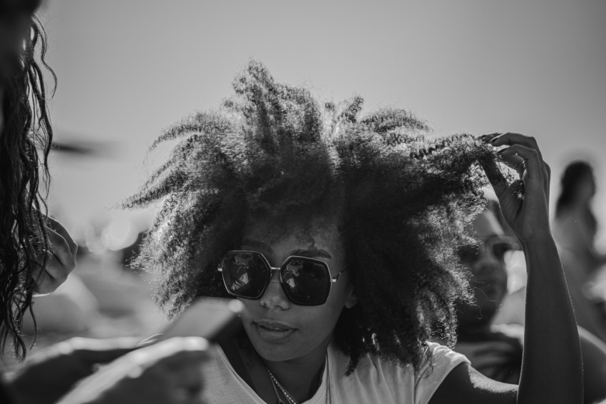 a woman with curly hair