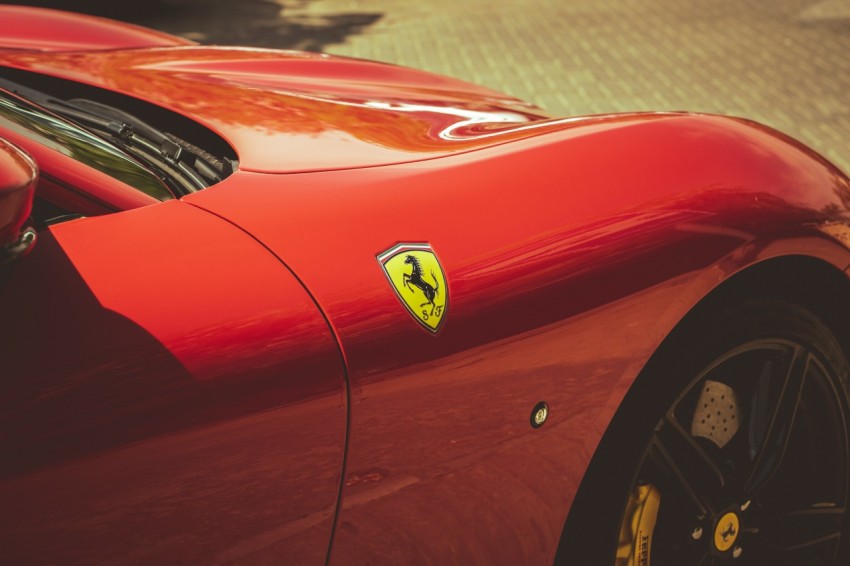 a close up of a red sports car