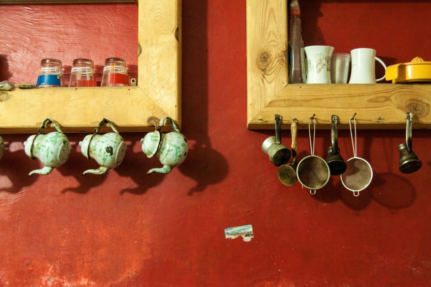 a kitchen counter with pots and pans