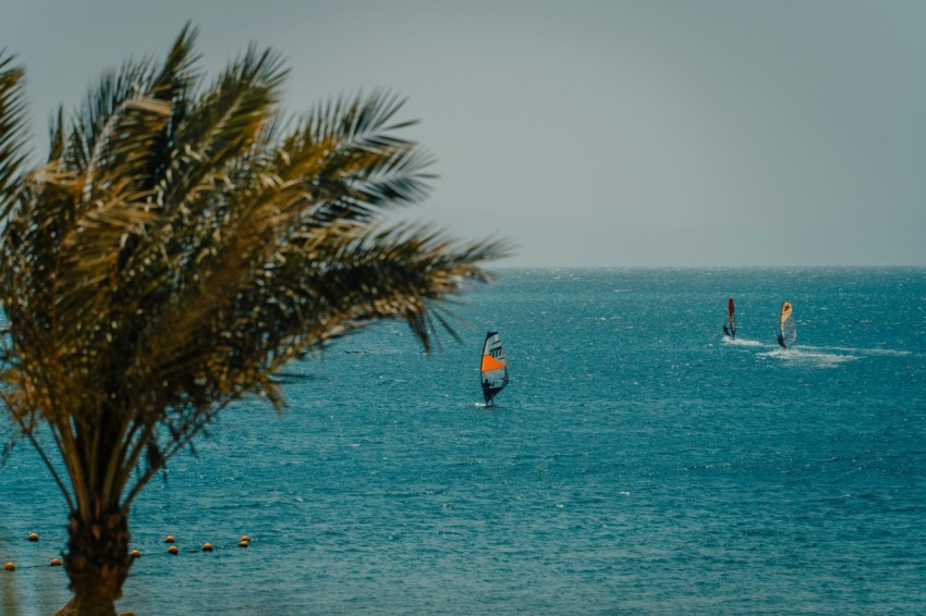 a group of people on a boat in the water