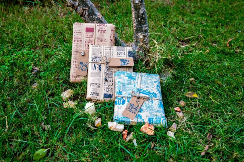 a pile of boxes on grass