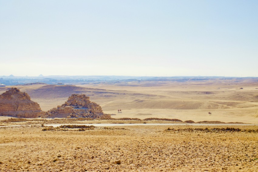 brown sand under white sky during daytime