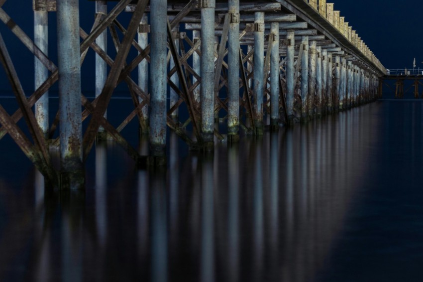 brown wooden dock on water