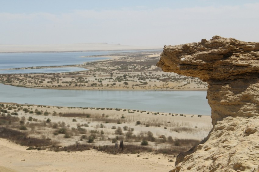 a view of a body of water from a cliff