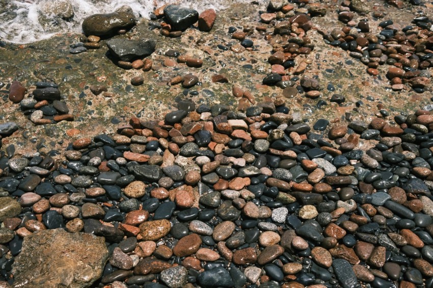 a rocky beach with water