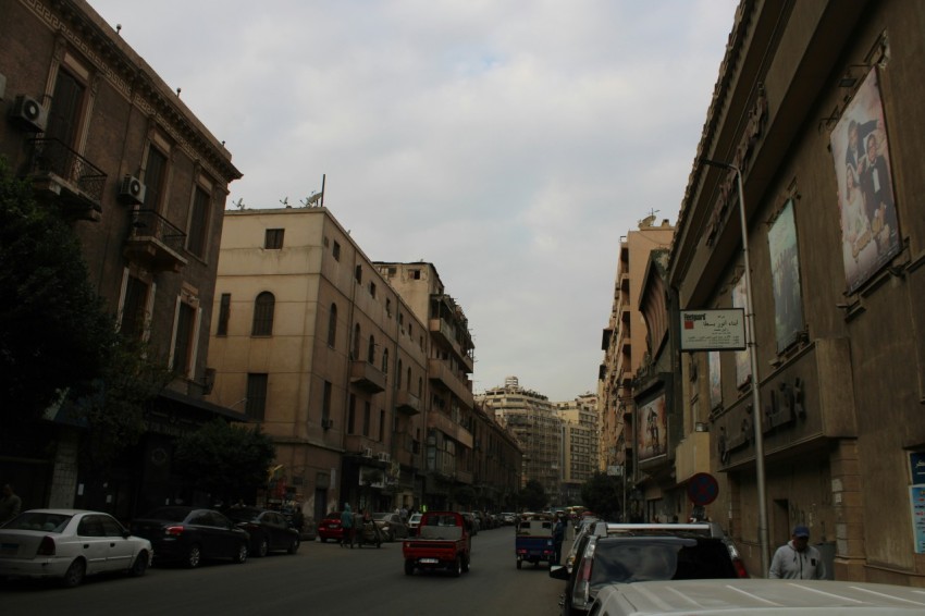 a city street filled with lots of tall buildings