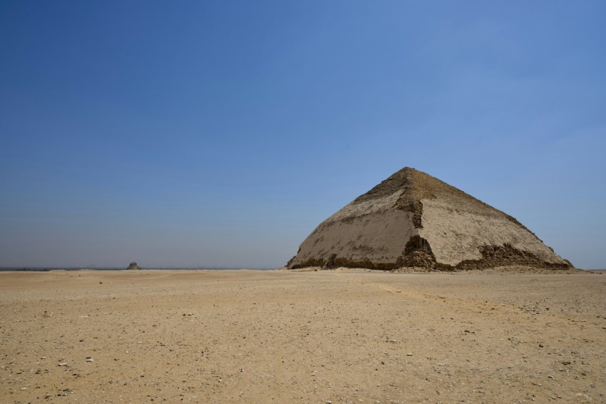 a large pyramid in the middle of a desert