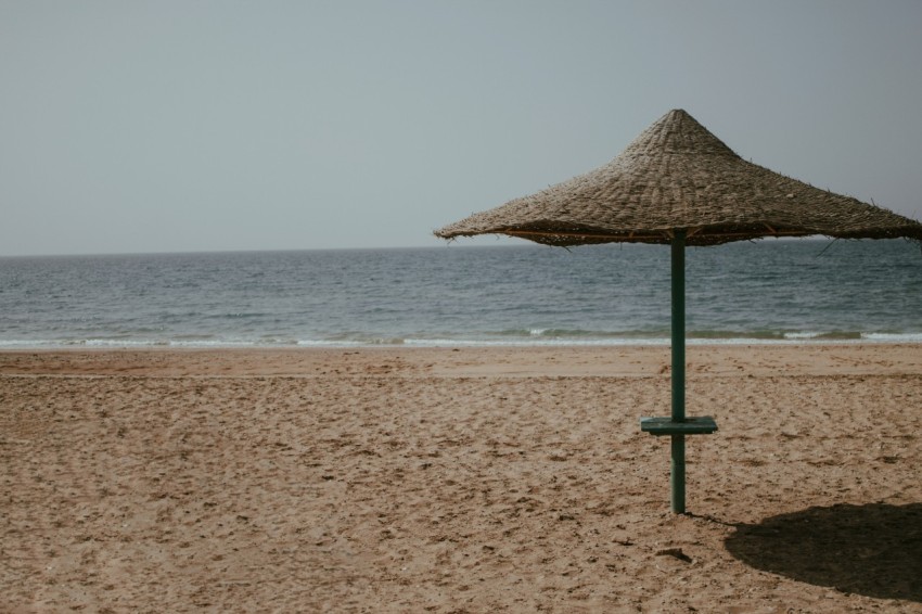 an umbrella on a beach