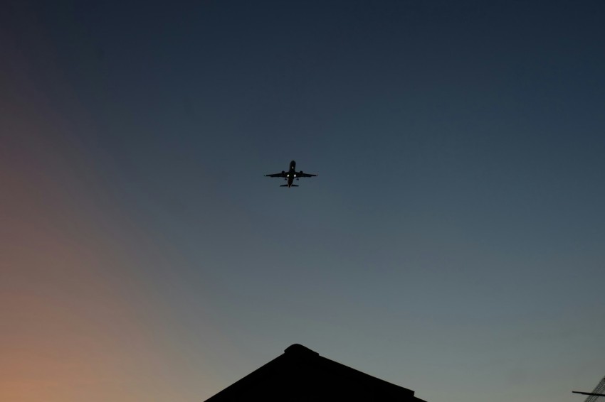 airplane under blue sky