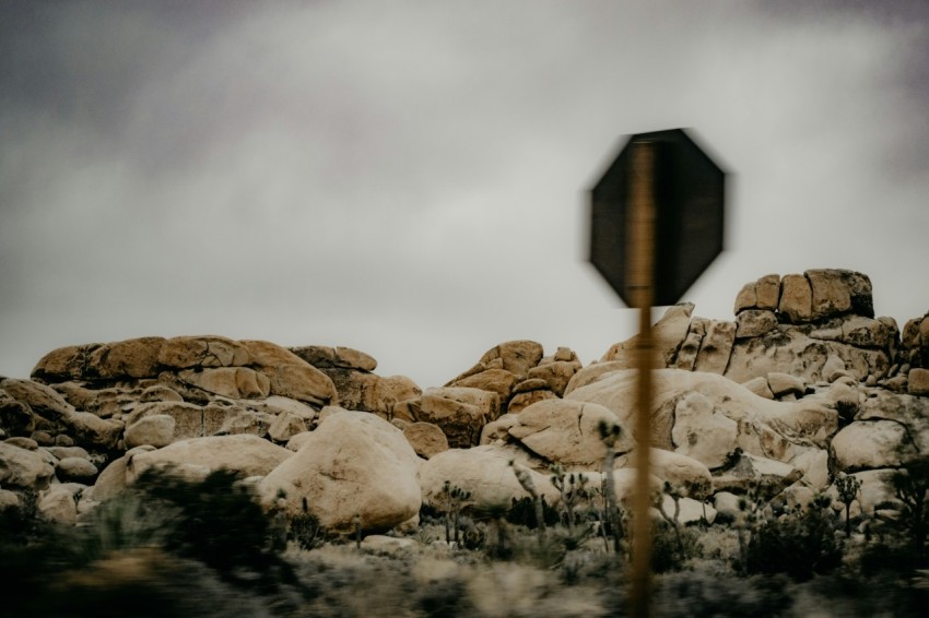 signage near rock formation