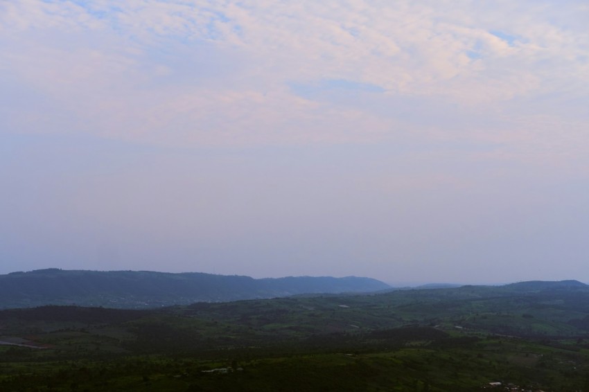 a landscape with hills and trees