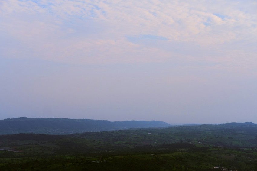 a landscape with hills and trees