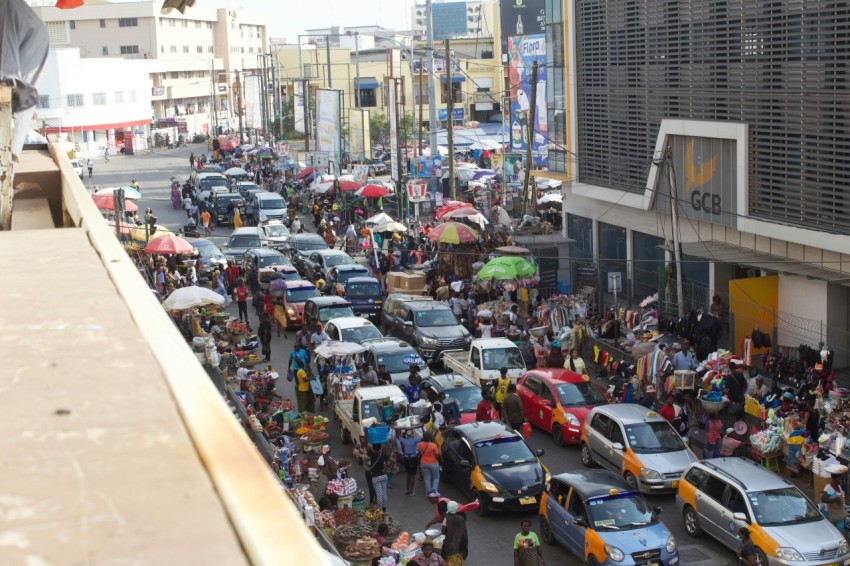 a busy street full of people 4c