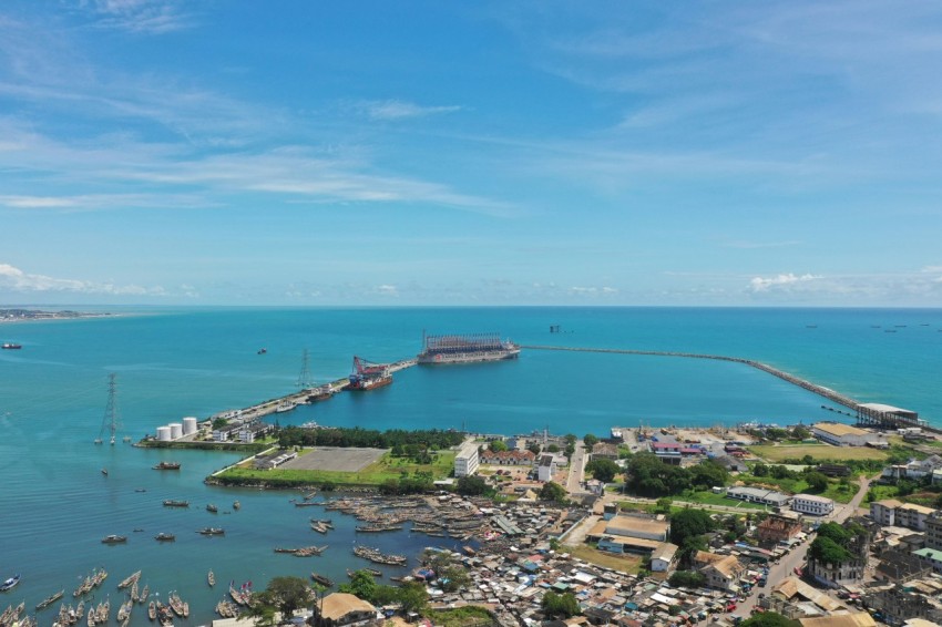 an aerial view of a harbor with boats in the water