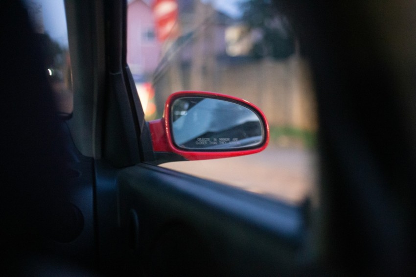 car side mirror showing car