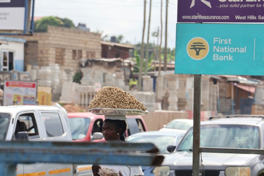 a street scene with focus on a sign