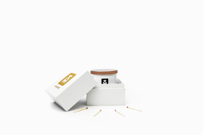 a white box with matches inside of it