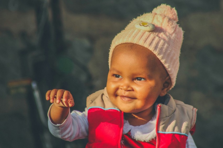 a baby wearing a hat