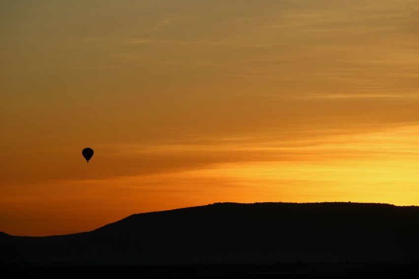 silhouette of mountain during sunset vpaa