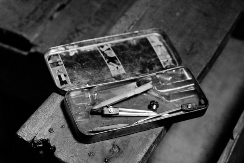 grayscale photo of smartphone on table