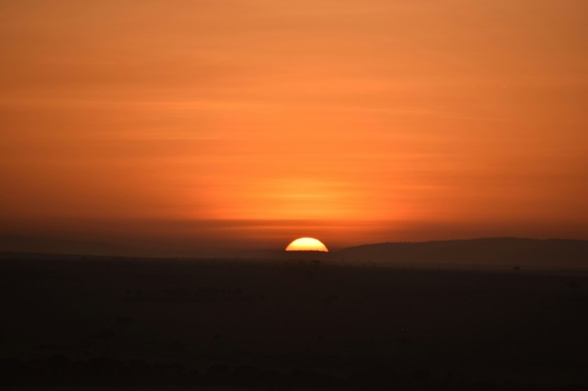 silhouette of mountain during sunset