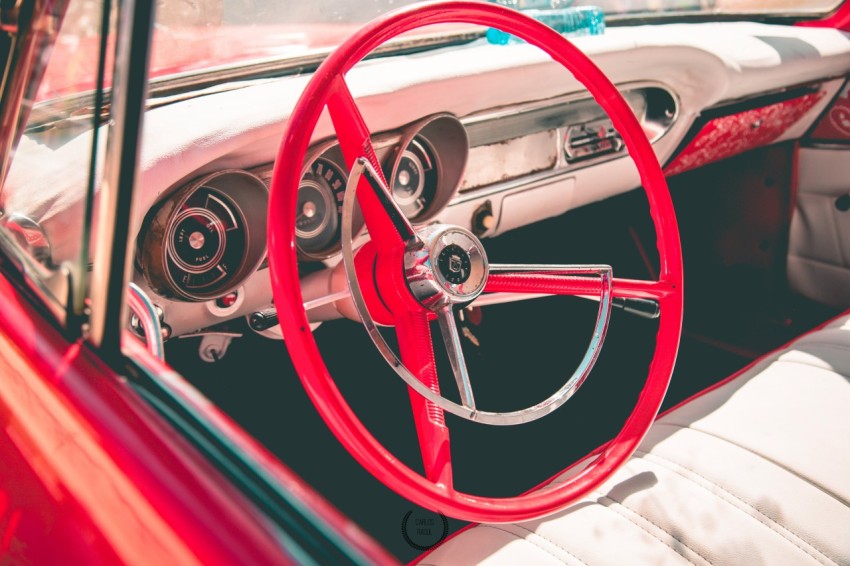 red vehicle steering wheel