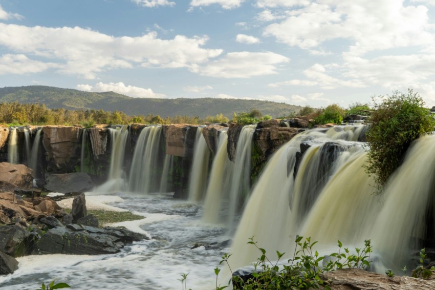 a waterfall with a group of waterfalls