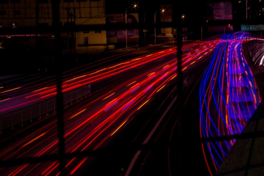 time lapse photography of cars on road