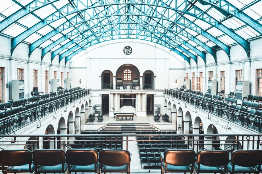 brown and black chairs inside building