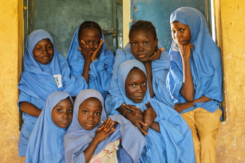 a group of people posing for the camera